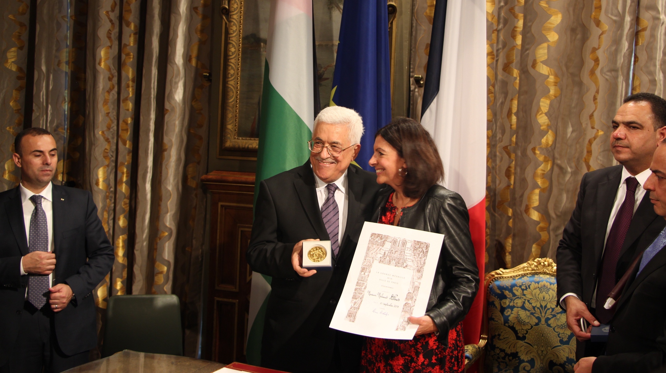 Palestinian Authority President Mahmoud Abbas receives the Grand Vermeil Medal, highest honor of the City of Paris, in honor of his work for peace by Mayor of Paris Anne Hidalgo in Paris, Sept. 21, 2015. (Onur Usta/Anadolu Agency/Getty Images)