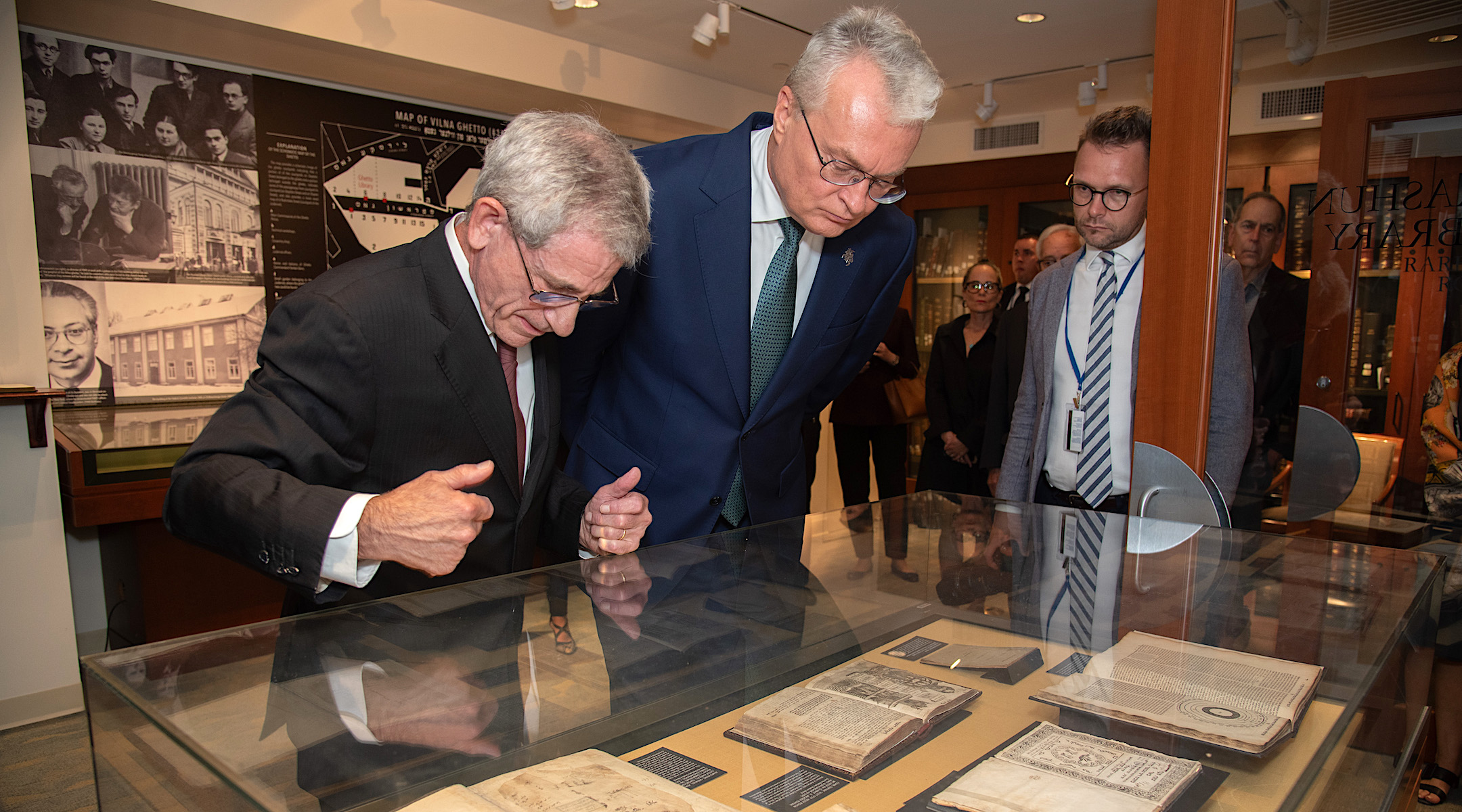 Jonathan Brent, executive director and CEO of YIVO, and Gitanas Nausėda, president of Lithuania, examine holdings in the Strashun Rare Books Room at YIVO’s New York headquarters, Sept. 18, 2023. The room is named for a Jewish scholar in Vilna (now Vilnius) who collected nearly 7,000 volumes of Yiddish and other books before his death in 1885. (YIVO/ Melanie Einzig)