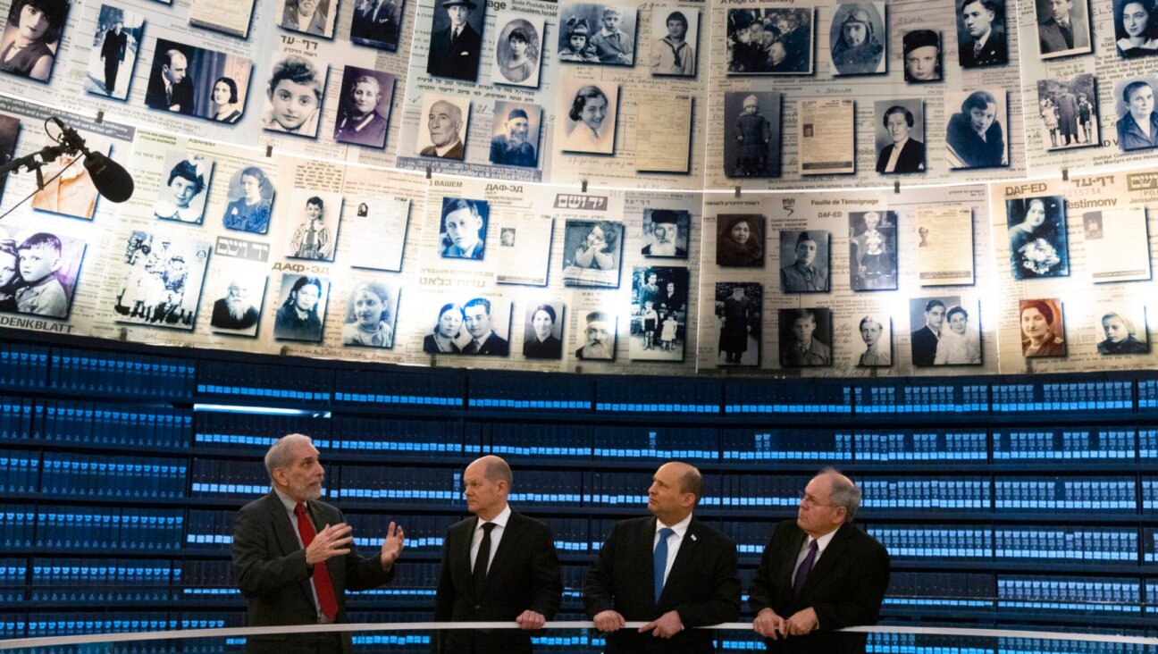 Yad Vashem Chairman Dani Dayan, second from right, with Israeli and German officials at Yad Vashem, Israel’s Holocaust memorial museum, in Jerusalem, March 2, 2022. (Olivier Fitoussi/Flash90)