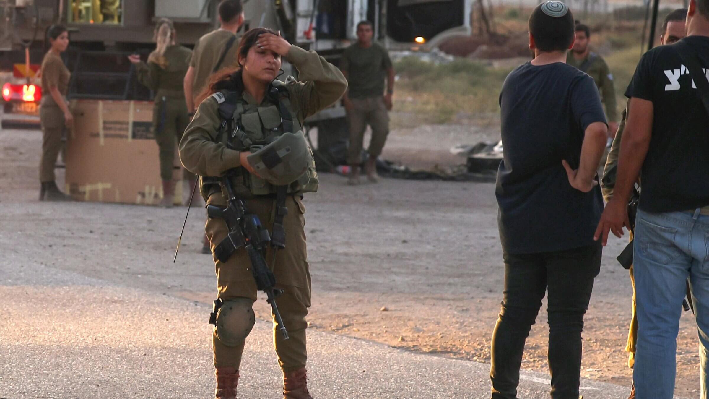 Members of Israeli security forces deploy at the site of a reported attack near al-Zubaydat village in the Jordan Valley area of the occupied West Bank on September 5, 2023. 