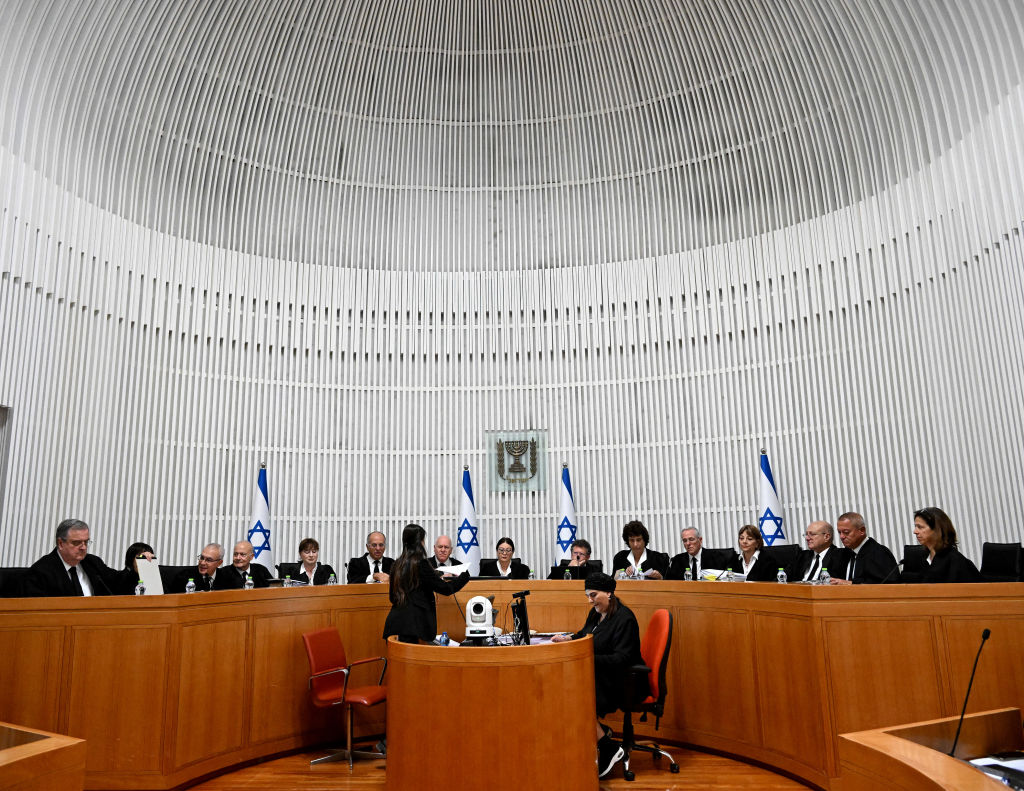 In a rare sight, all 15 judges of Israel's Supreme Court gathered to hear arguments today about Netanyahu's controversial plan to override the judiciary. (Getty)