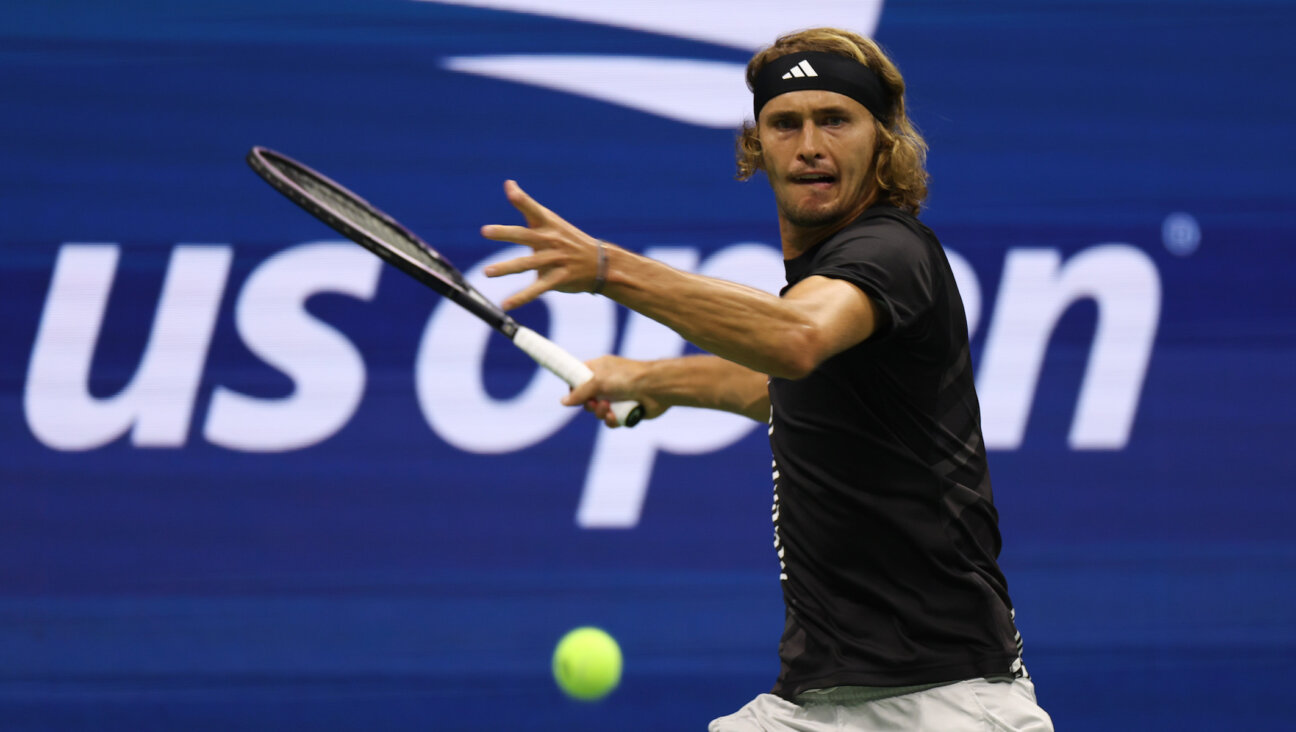 Alexander Zverev returns a shot against Jannik Sinner during a U.S. Open match at the USTA Billie Jean King National Tennis Center in New York City, Sep. 4, 2023. (Al Bello/Getty Images)