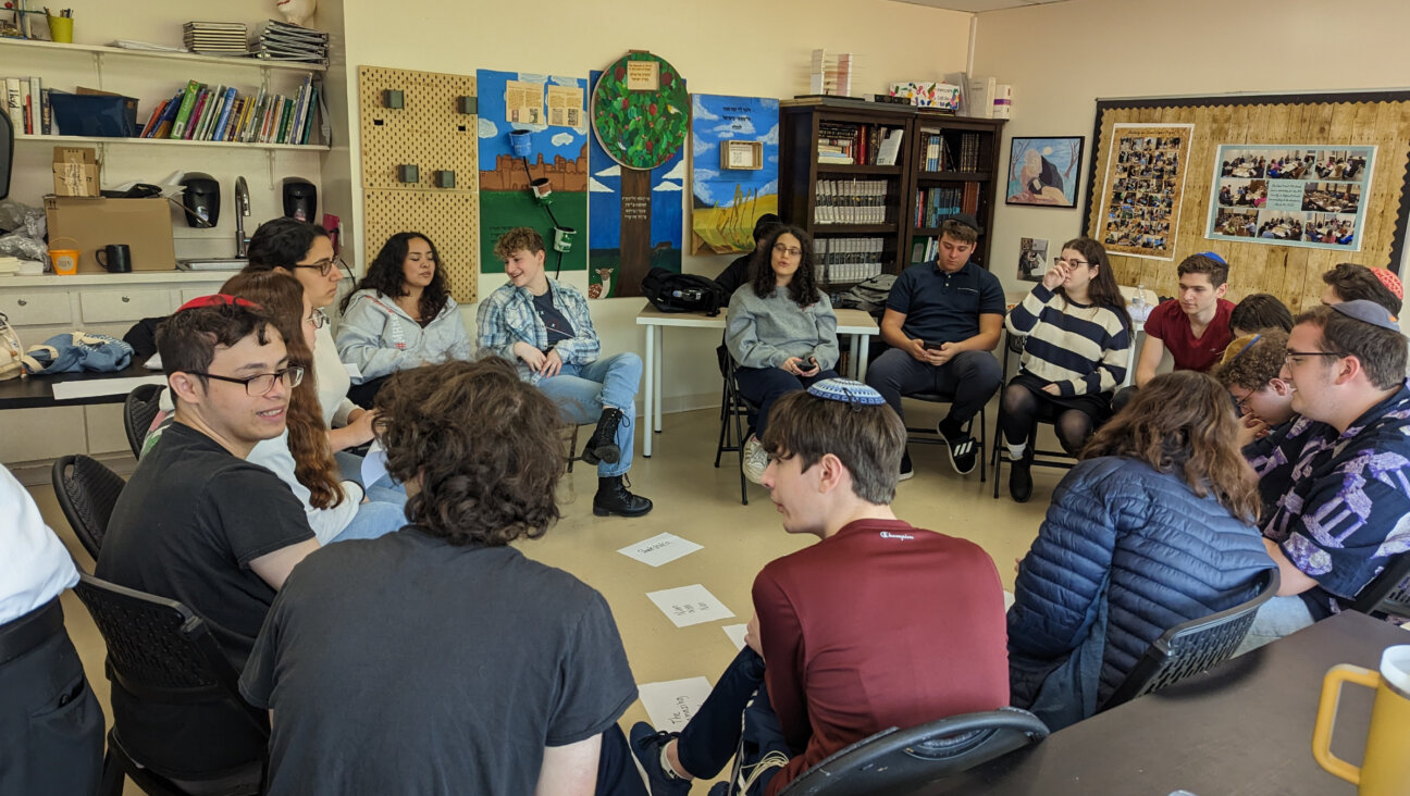 Idea School seniors meet with two visiting teens from Israel at the school this spring during Hebrew class.