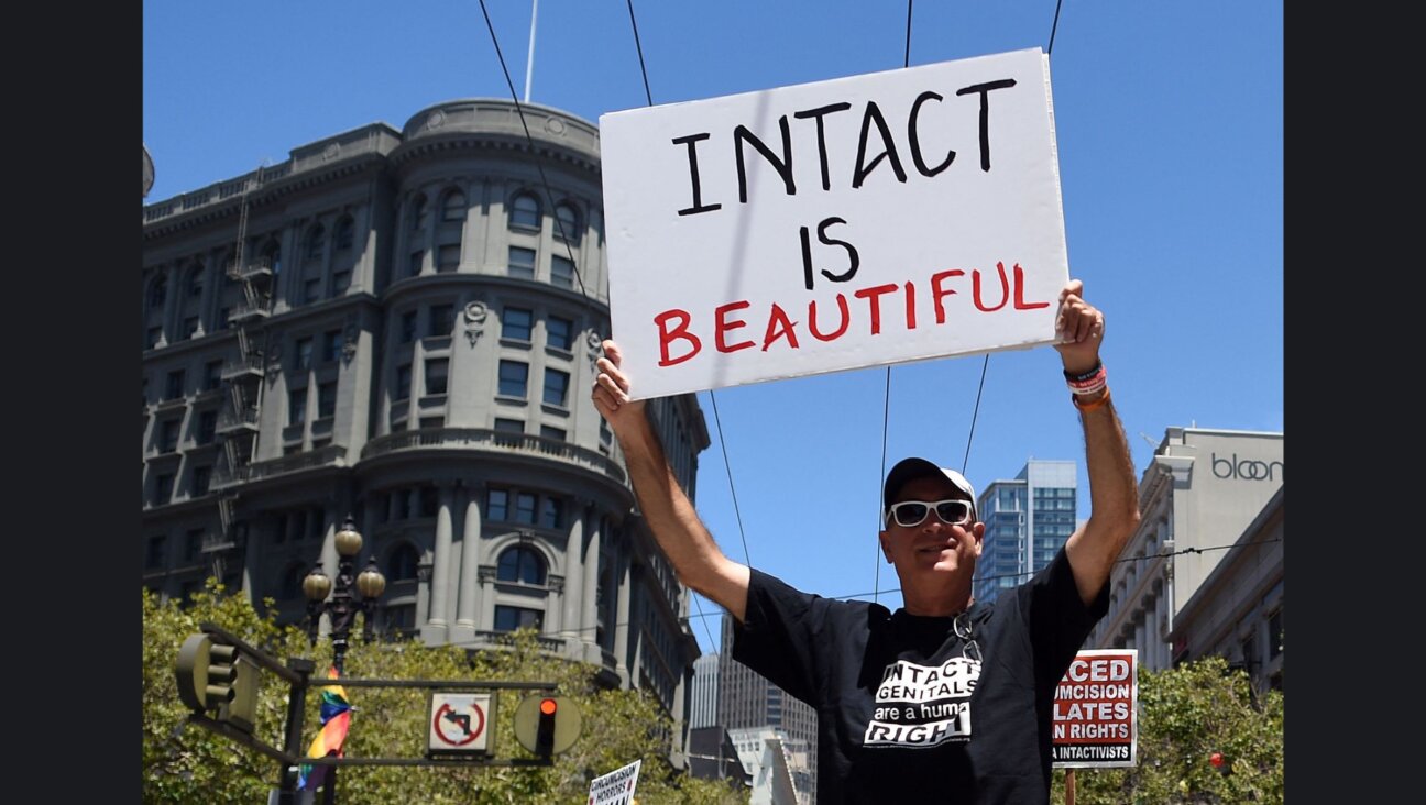 An anti-circumcision activist at a 2016 Gay Pride rally in San Francisco.