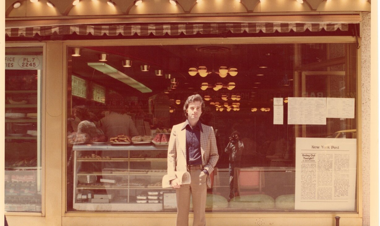 The author outside the Carnegie Deli, circa 1974. Photographer, visible in the window, is writing partner Jim Mullholland.