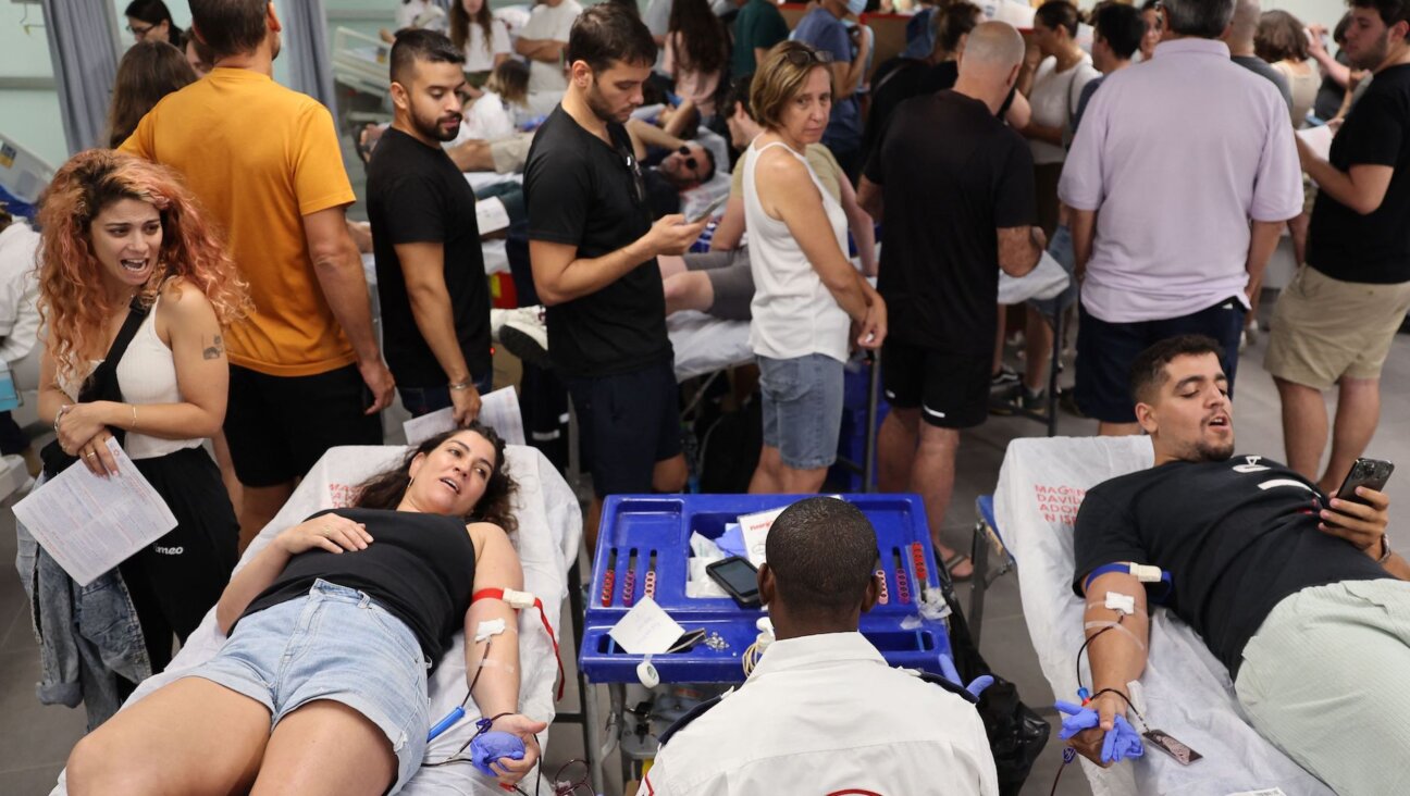 Israelis donate blood at a hospital in Tel Aviv after a barrage of rockets were fired and fighters from the Gaza Strip infiltrated Israel, Oct. 7, 2023. (Jack Guez/AFP via Getty Images)