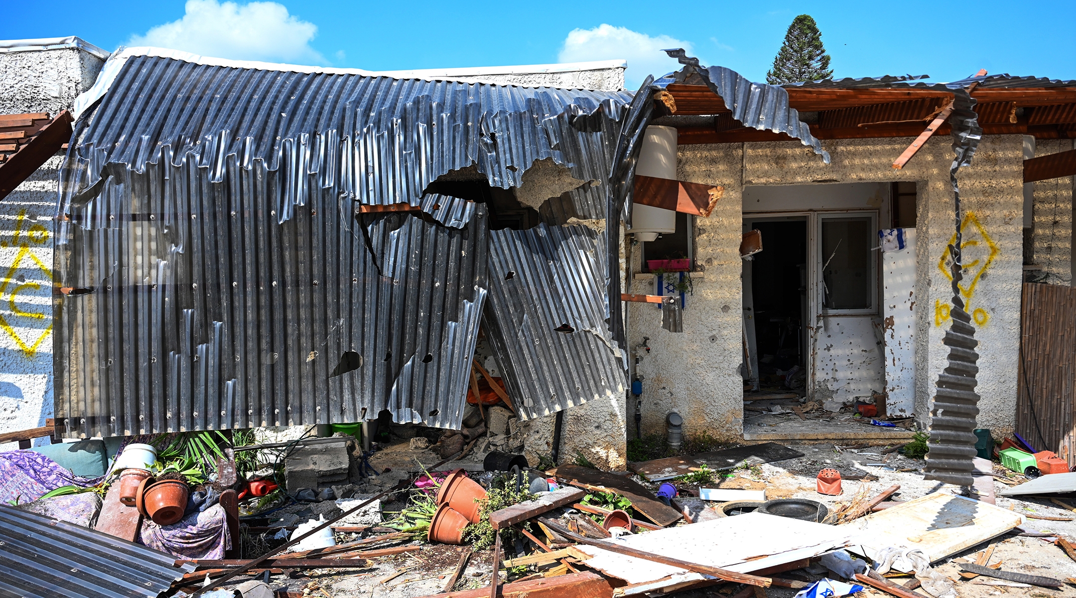 A house lies in ruins after an attack by Hamas militants in Kfar Aza, Israel, Oct. 10, 2023. (Alexi J. Rosenfeld/Getty Images)