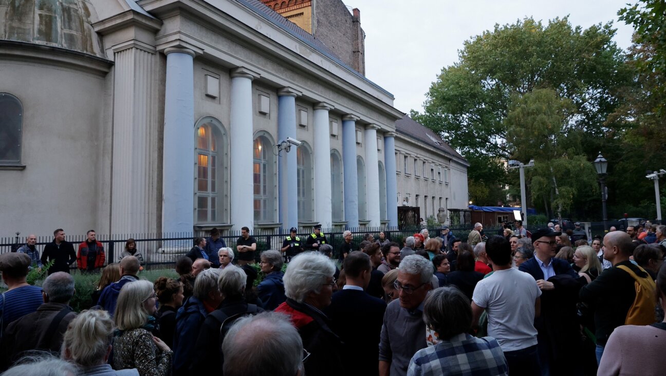 People take part in a vigil in front of Berlin’s Fraenkelufer synagogue, Oct. 13, 2023. (Carsten Koall/picture alliance via Getty Images)