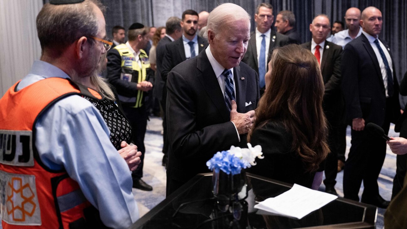 U.S. President Joe Biden meets with people affected by this month’s attacks by the terrorist group Hamas on Israel, in Tel Aviv, Oct. 18, 2023. (Brendan Smialowski/AFP via Getty Images)