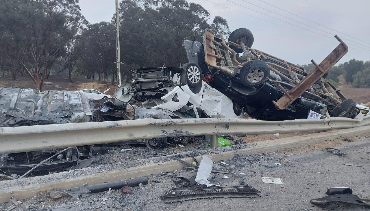 Burned-out cars near Kibbutz Re'im on Oct. 8, 2023, after a Hamas attack.