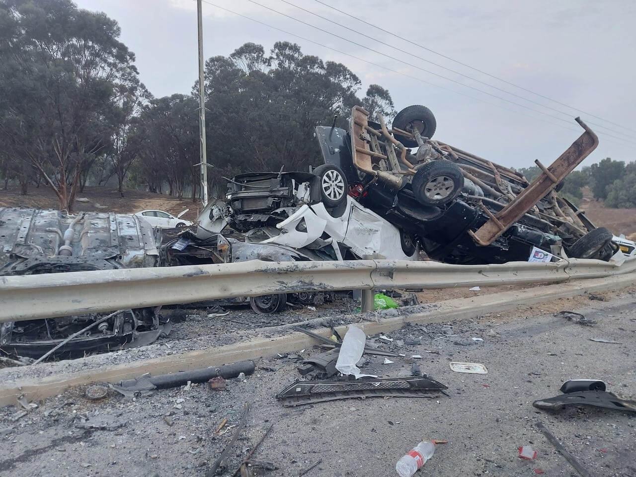 Burned-out cars near Kibbutz Re'im on Oct. 8, 2023, after a Hamas attack.