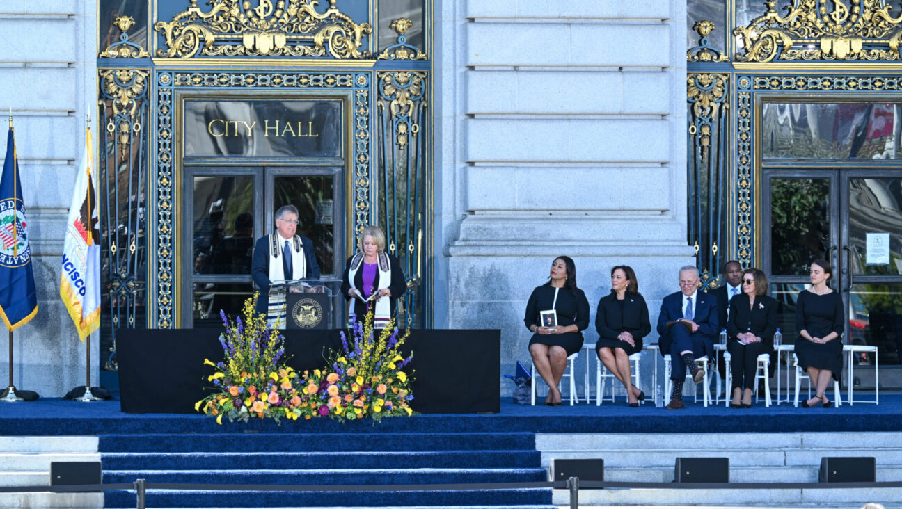 Rabbi Jonathan Singer speaks and Cantor Roz Barak stands beside him as (L-R) San Francisco Mayor London Breed, U.S Vice President Kamala Harris, Sen. Chuck Schumer, Rep. Nancy Pelosi and Dianne Feinstein’s granddaughter Eileen Feinstein Mariano attend a memorial service for Sen. Dianne Feinstein’s outside of San Francisco City Hall, Oct. 5, 2023. (Tayfun Coskun/Anadolu Agency via Getty Images)