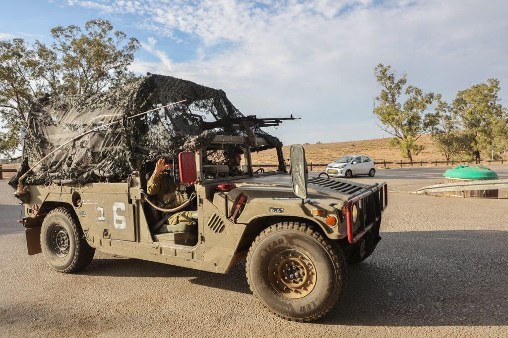 Israeli troops take position in the southern city of Beersheba following an unprecedented militant attack by Hamas fighters on Oct. 7, 2023. 