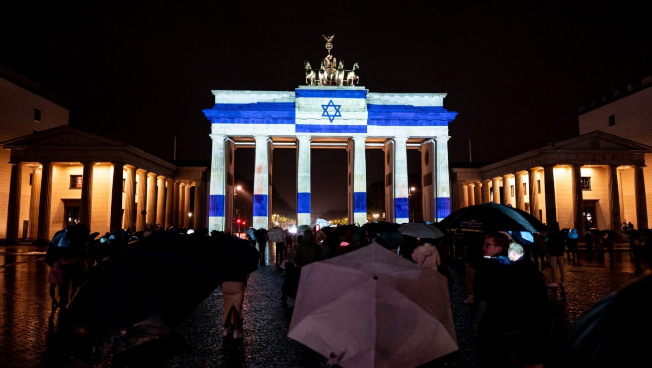 The Israeli flag was projected onto the Brandenburg Gate in Berlin as a show of solidarity.