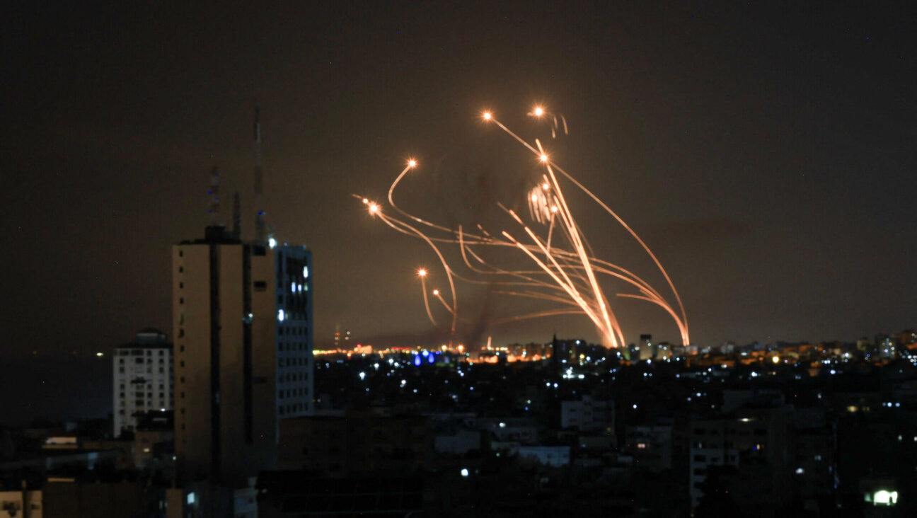 Israel's Iron Dome defense system attempts to intercept a rocket, fired from the Gaza Strip, over the city of Netivot in southern Israel on Saturday. 