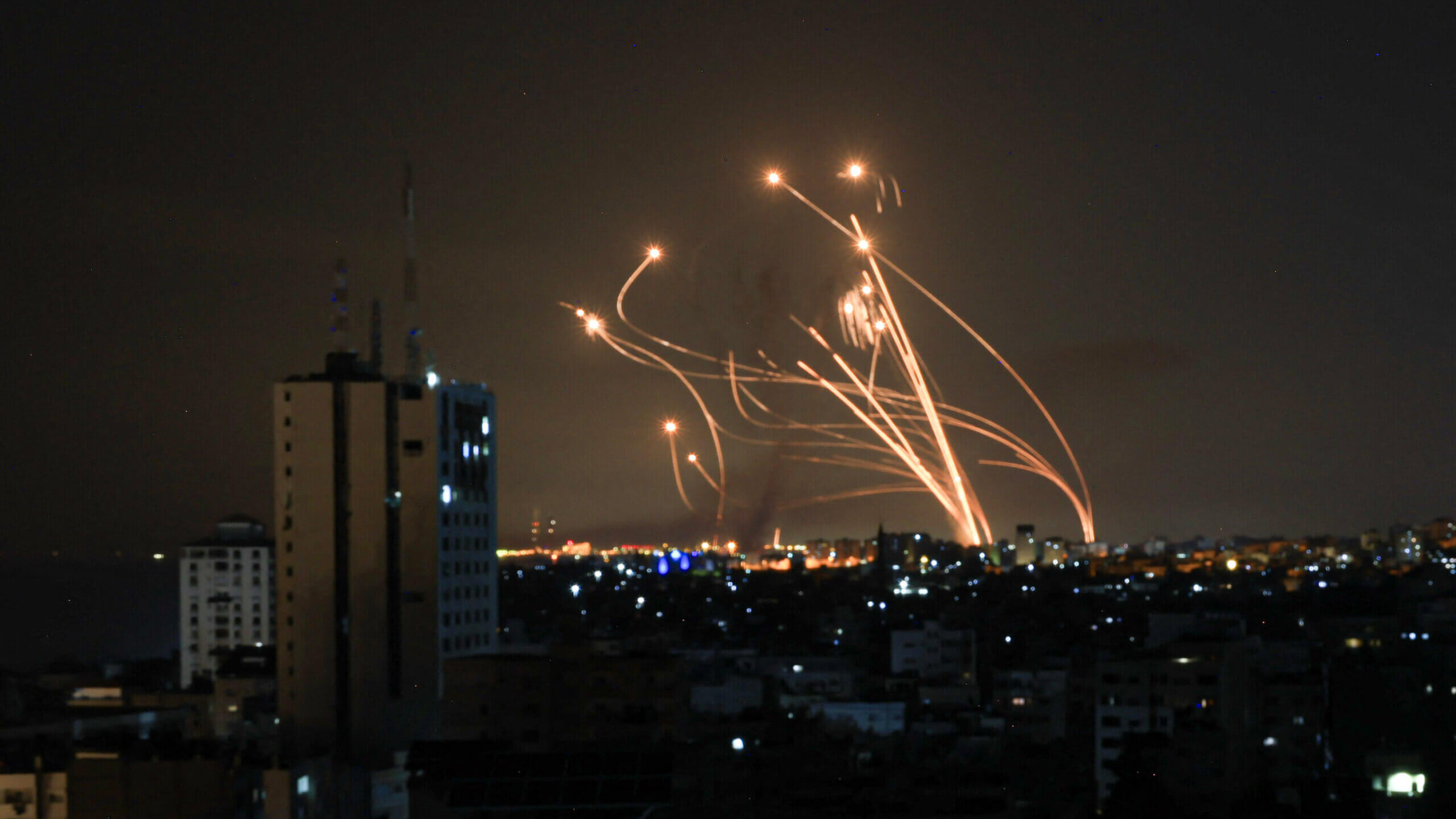 Israel's Iron Dome defense system attempts to intercept a rocket, fired from the Gaza Strip, over the city of Netivot in southern Israel on Saturday. 