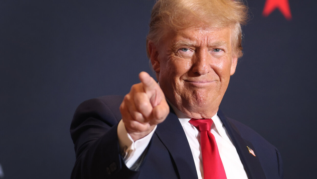 Republican presidential candidate former President Donald Trump arrives for a rally on October 07, 2023 in Cedar Rapids, Iowa. 