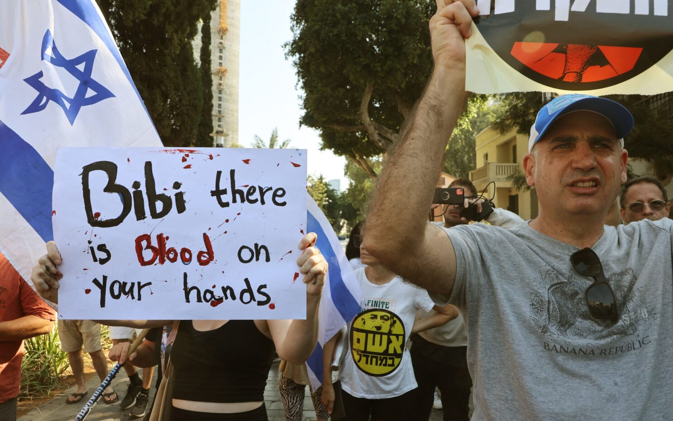 Supporters and family members of Israeli hostages taken by Hamas during a surprise attack on Israel protest outside of the Israeli military base of HaKirya in central Tel Aviv, Oct. 14, 2023. (Gil Cohen-Magen/AFP via Getty Images)