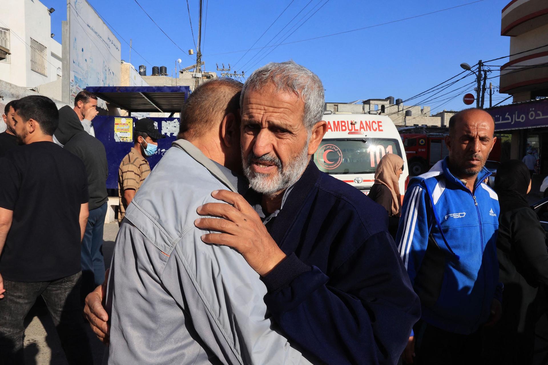 Mourners attend the Sunday funeral of members of the Zannoun family killed in an Israeli airstrike that hit a refugee camp in the southern Gaza Strip. (SAID KHATIB / AFP) 