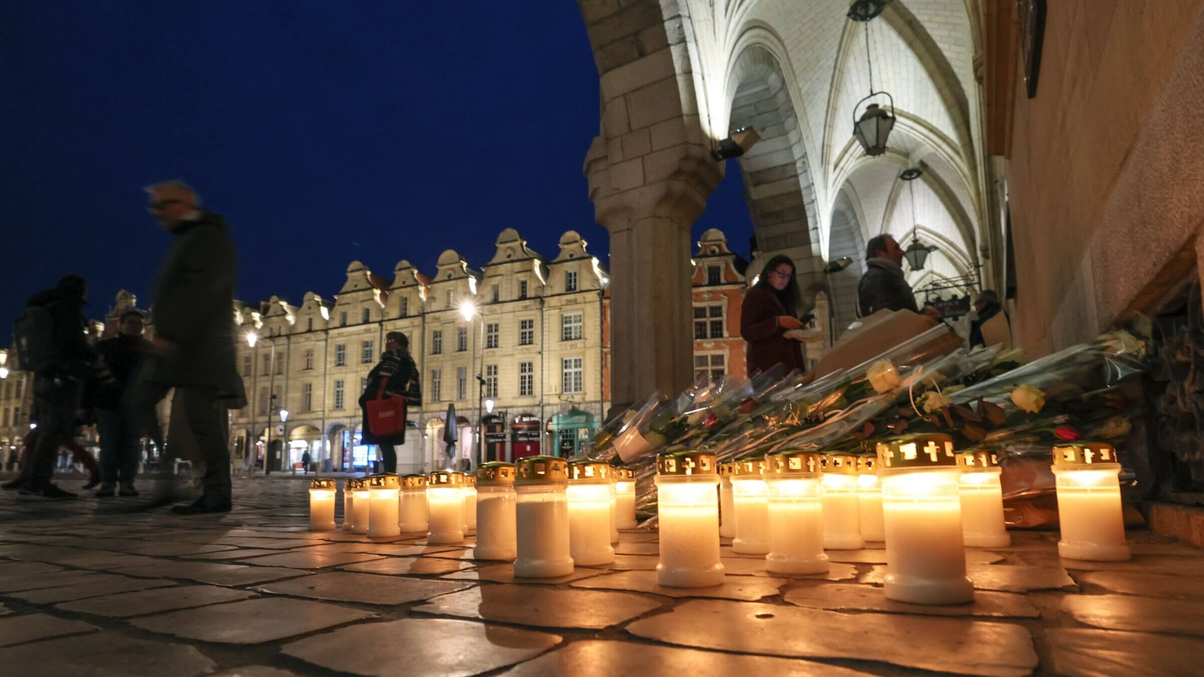 A memorial for French teacher Dominique Bernard, who died in a knife attack in Arras.