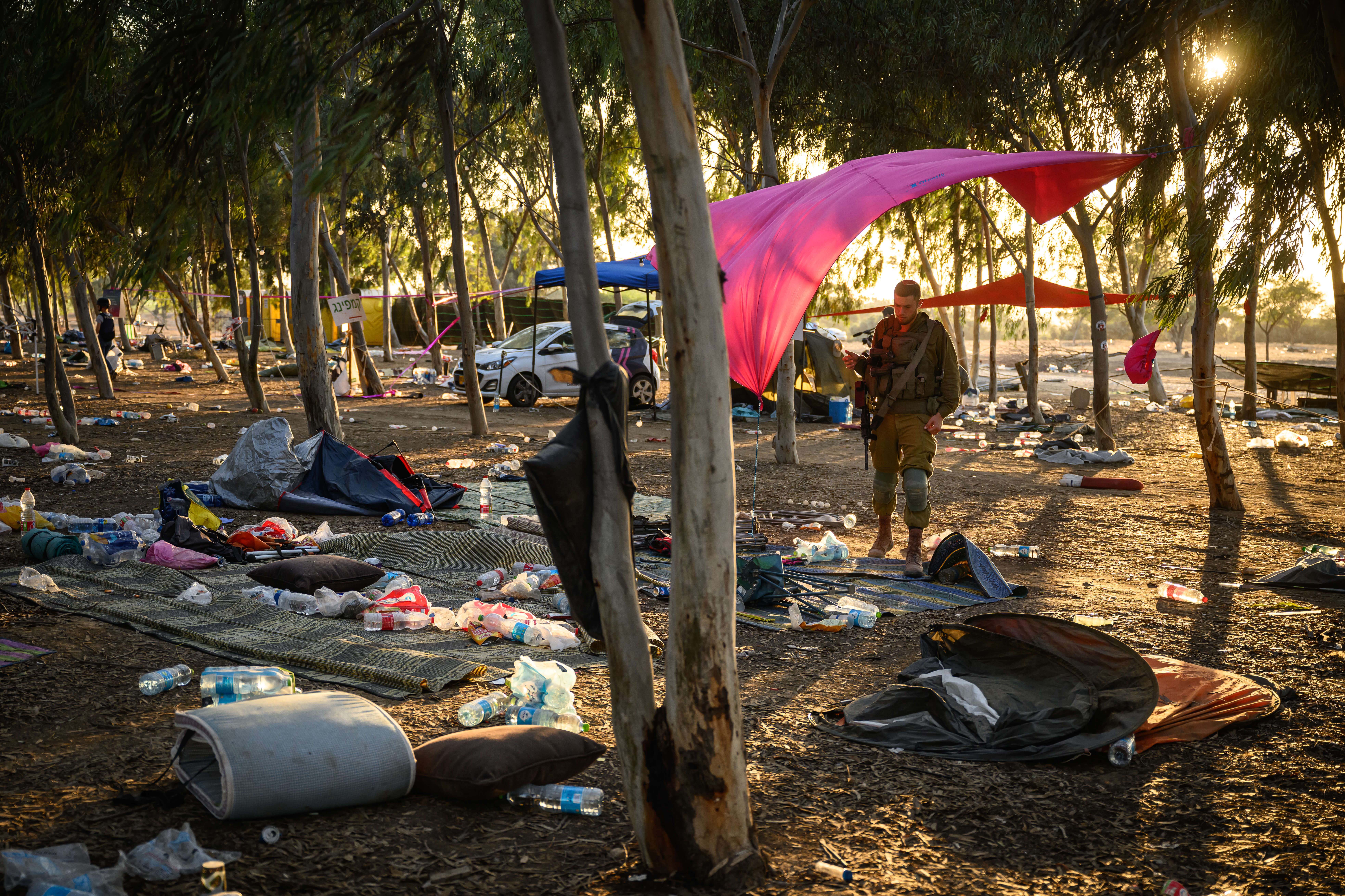 The Supernova Music Festival site on Oct. 12, as members of the security forces searched for identification and personal effects of victims of the Hamas attack.