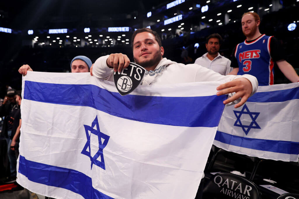 Fans show support for Israel prior to the start of an exhibition game between the Brooklyn Nets and Maccabi Ra'anana at Barclays Center on Oct. 12, 2023 in New York City.