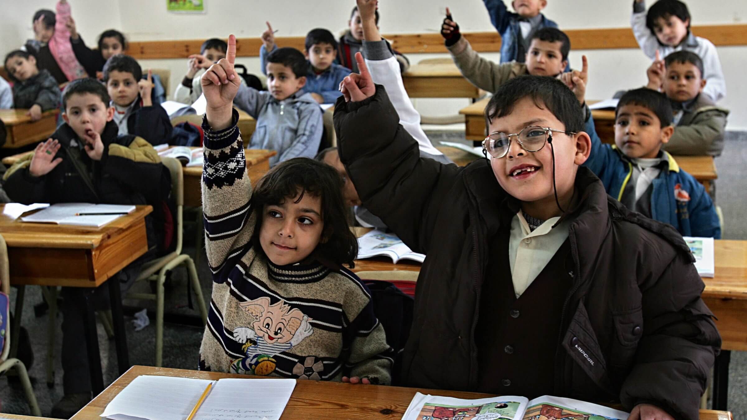 Palestinian students attend a national education lesson at the Dar Al-Arqam school in Gaza City, founded by Hamas, in 2006.