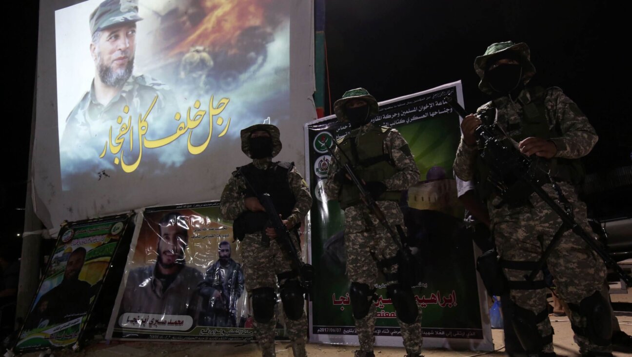 Fighters from the Ezzedine al-Qassam Brigades, the armed wing of the Palestinian Hamas movement, attend a memorial service in the Gaza Strip in 2017.  