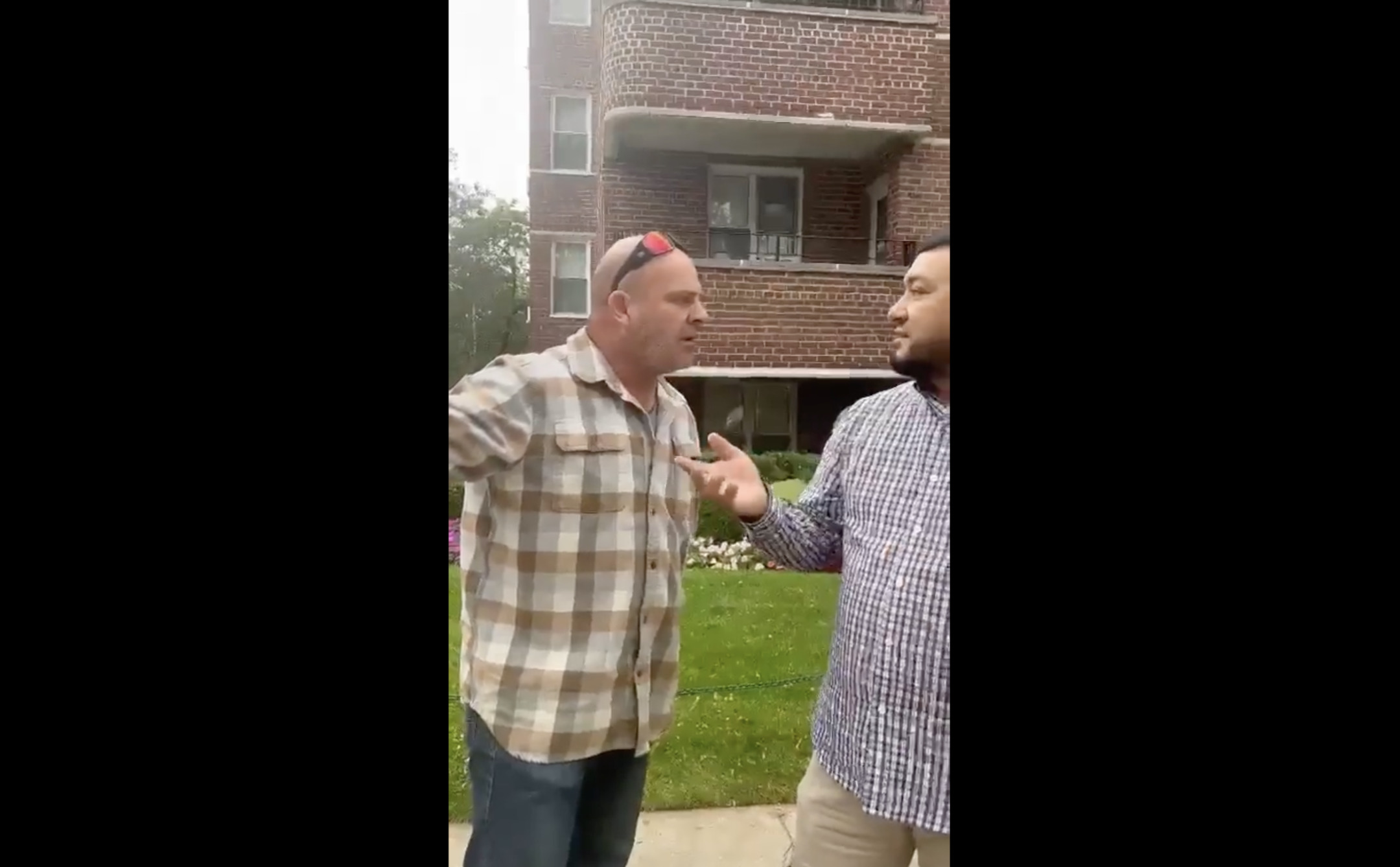 A man confronts another man who was filmed removing Israeli hostage posters on a street corner in Queens, according to video shared by the watchdog group StopAntisemitism. (X)