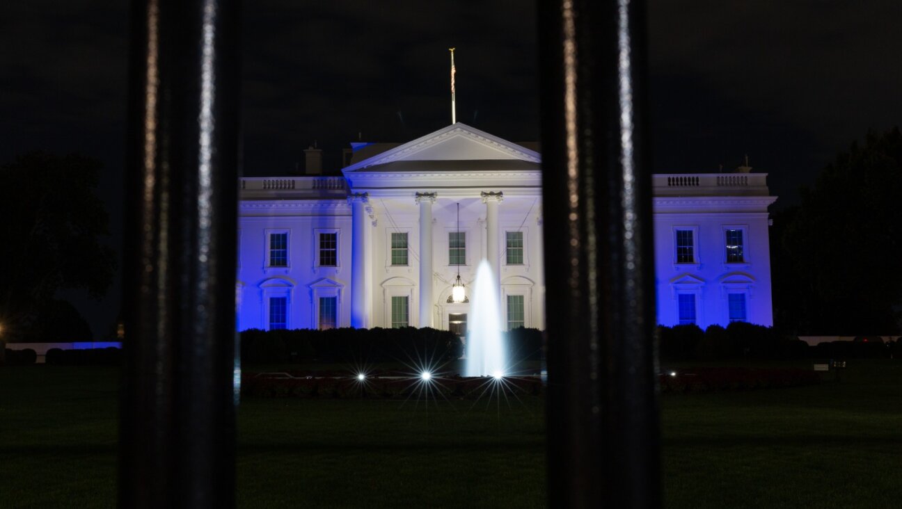 The White House illuminated in blue and white in support of Israel, on Oct. 9, 2023. 