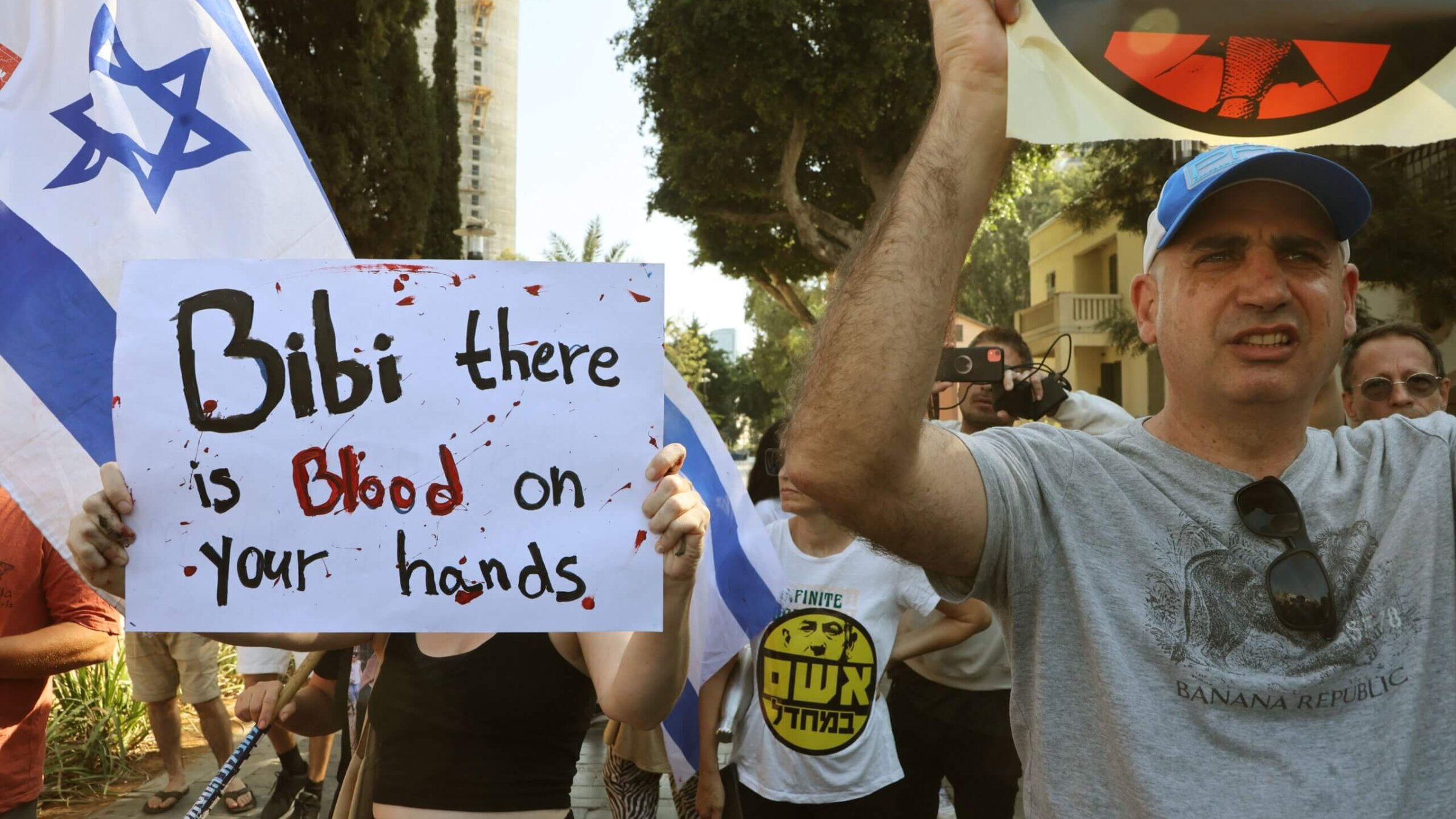 Supporters and family members of Israeli hostages snatched by the Palestinian militant group Hamas last week in a surprise attack into Israel, protest outside of the Israeli military base of Ha-Kirya in central Tel Aviv on October 14, 2023.