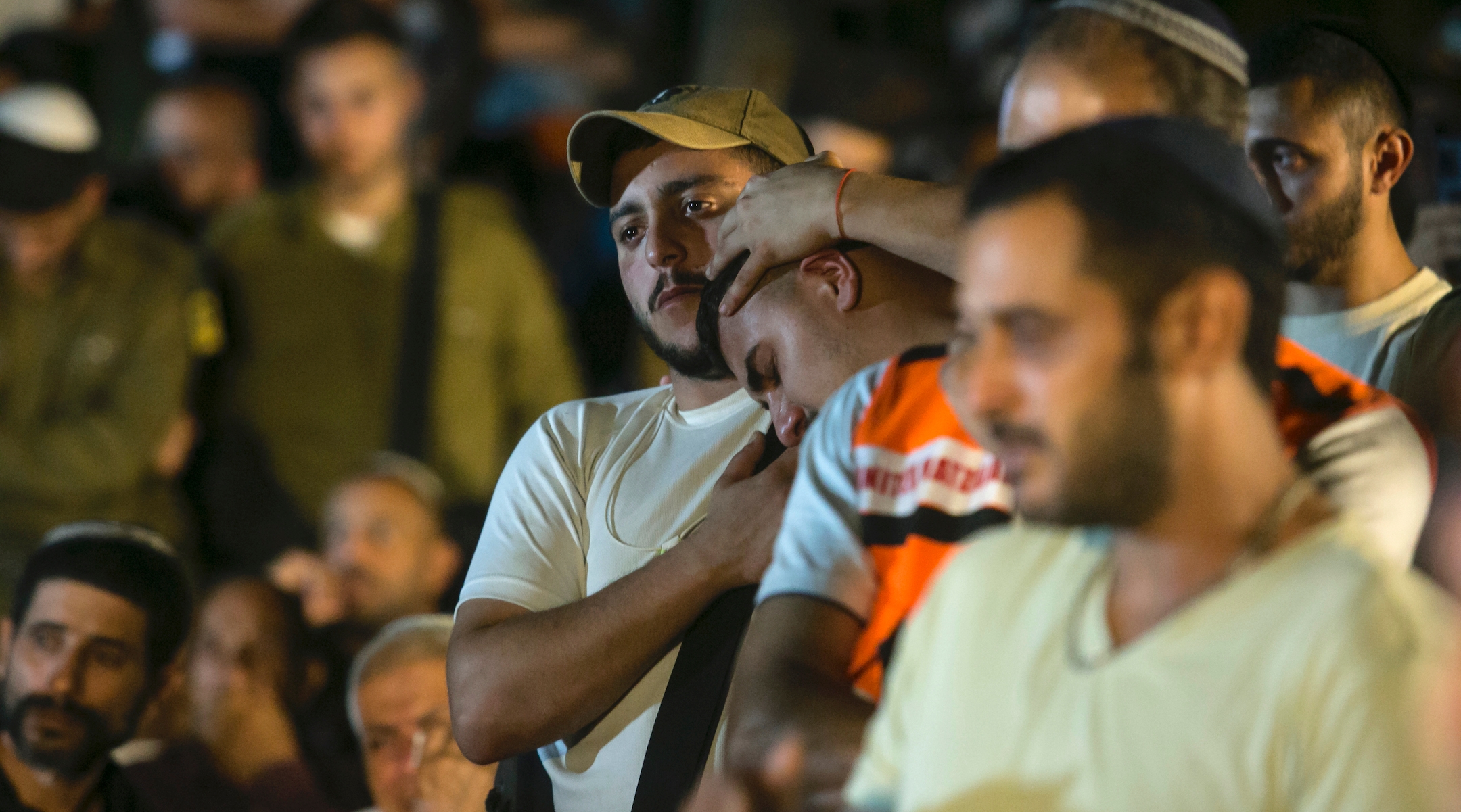 Family and friends of fallen IDF soldier Amit Zur, who died in a battle with Hamas gunmen, react during his funeral in Eliayachin, Israel on Oct. 10, 2023. (Amir Levy/Getty Images)