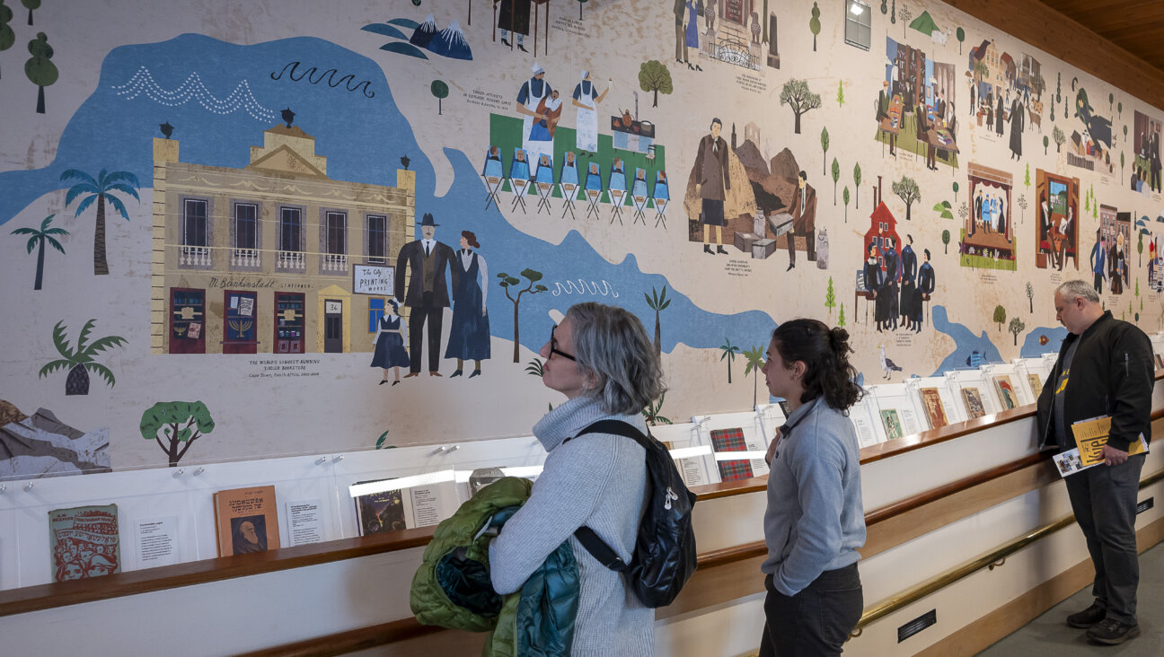 A colorful 60-foot mural depicting the history of Yiddish culture, commissioned for the Yiddish Book Center's new permanent exhibit from German illustrator Martin Haake.