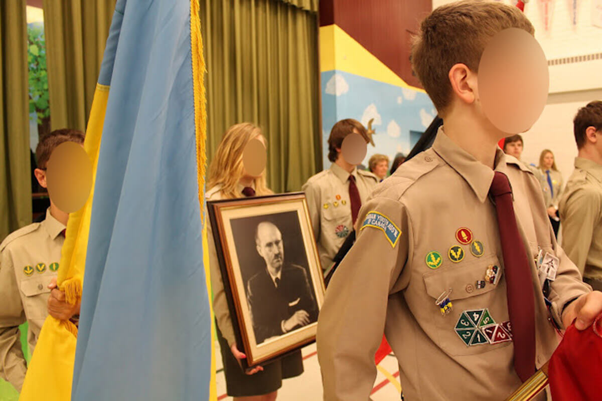 In this undated photo, members of the Ukrainian Youth Association of Canada hold a ceremony honoring Yaroslav Stetsko, the Nazi collaborator who had written "I insist on extermination of the Jews."