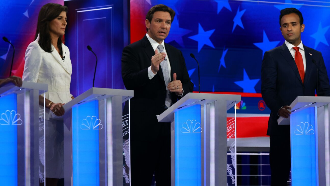 Republican presidential candidate Florida Gov. Ron DeSantis, in the center, speaks alongside former U.N. Ambassador Nikki Haley and Vivek Ramaswamy during the NBC News Republican Presidential Primary Debate at the Adrienne Arsht Center for the Performing Arts of Miami-Dade County in Miami, Nov. 8, 2023. (Joe Raedle/Getty Images)