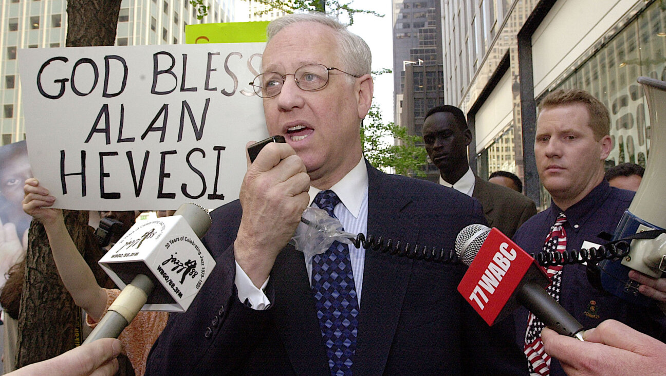 Alan Hevesi, running for mayor of New York, speaks at an anti-slavery protest in front of the New York Mission to Sudan, May 2, 2001. (Spencer Platt/Newsmakers via Getty)