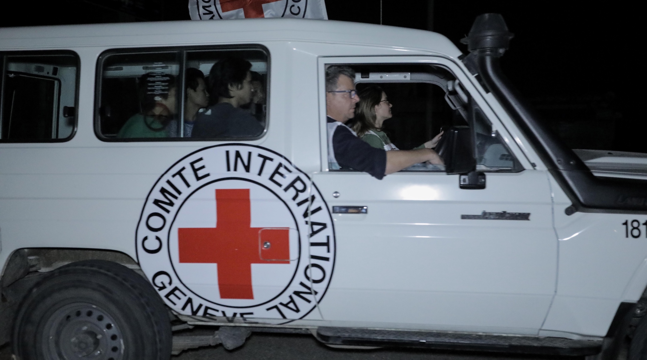 Hostages are transported in International Committee of the Red Cross vehicles from the Gaza Strip through the Rafah land crossing in Rafah, Gaza, Nov. 25, 2023. (Ahmad Hasaballah/Getty Images)