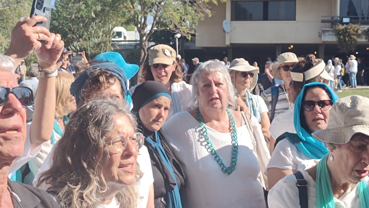 Mourners at a memorial service for Vivian Silver on Nov. 16, 2023. (Eliyahu Freedman)