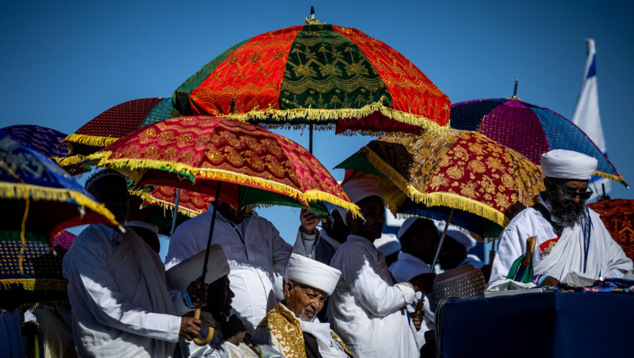 Thousands of Ethiopian Jews take part in a prayer of the Sigd holiday on the Armon Hanatziv Promenade overlooking Jerusalem, Nov. 23, 2022. (Yonatan Sindel/Flash90)