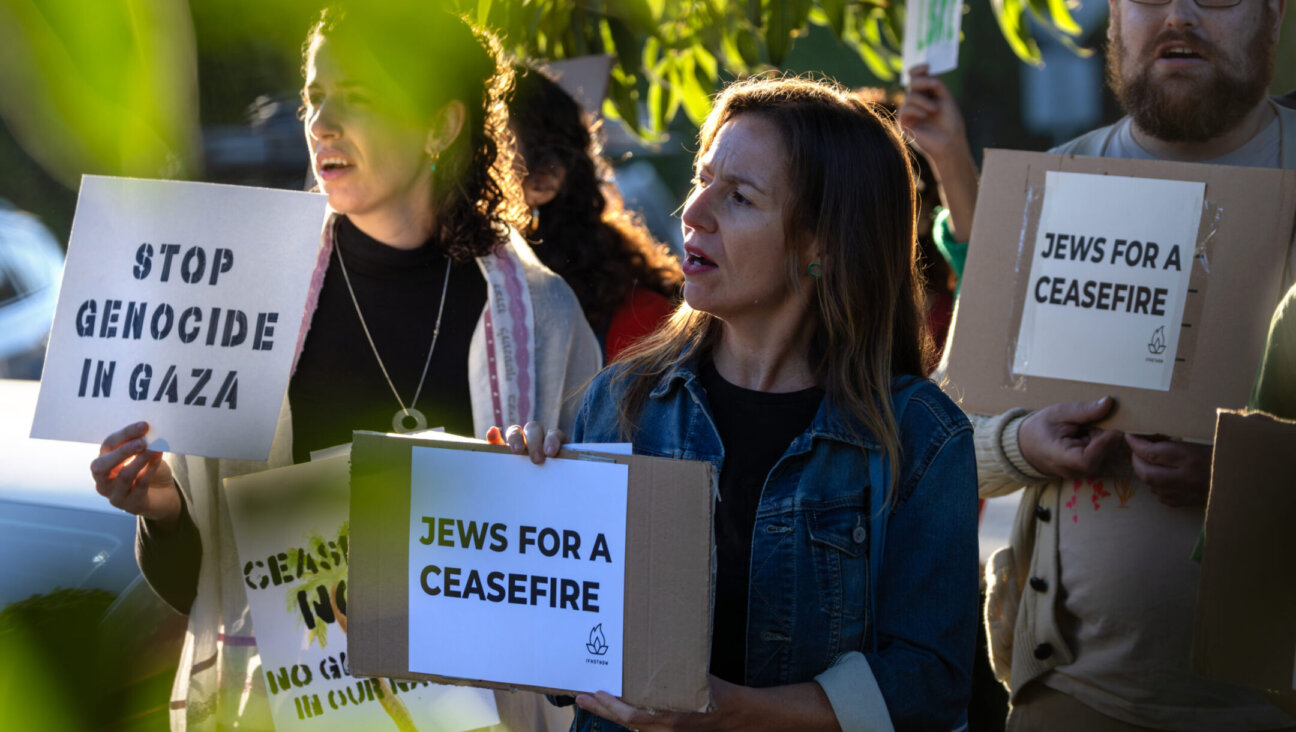 Members of the advocacy group IfNotNow sing during a protest outside the Los Angeles home of Vice President Kamala Harris calling “on those in power to oppose any policies that privilege one group of people over another, in Israel/Palestine and in the U.S,” Oct. 19, 2023. (Irfan Khan / Los Angeles Times via Getty Images)