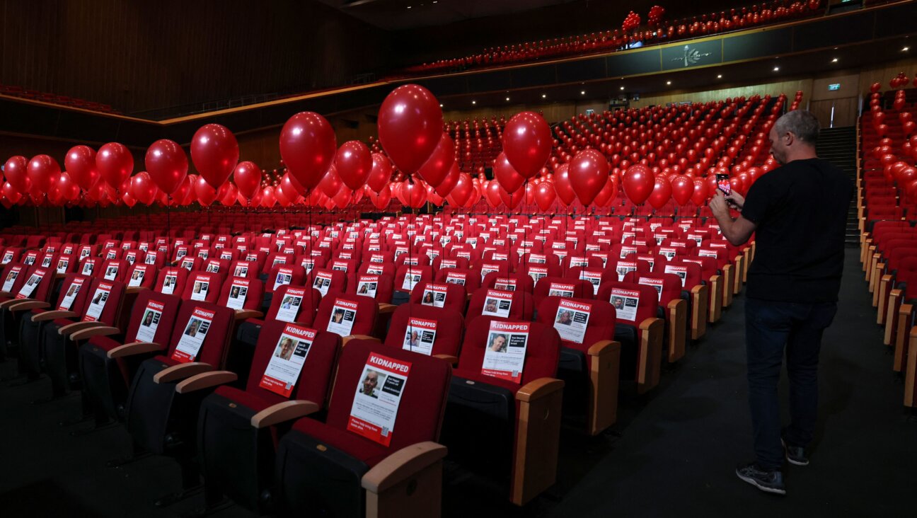 An installation of balloons and pictures of Israeli hostages abducted by Palestinian militants during the Oct. 7 attack.