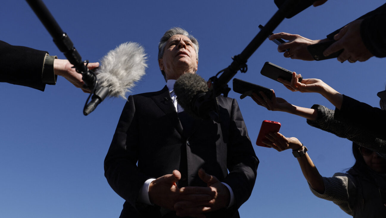 Secretary of State Antony Blinken talks to reporters prior to boarding his aircraft at Joint Base Andrews in Maryland, on his way to the Middle East and Asia.