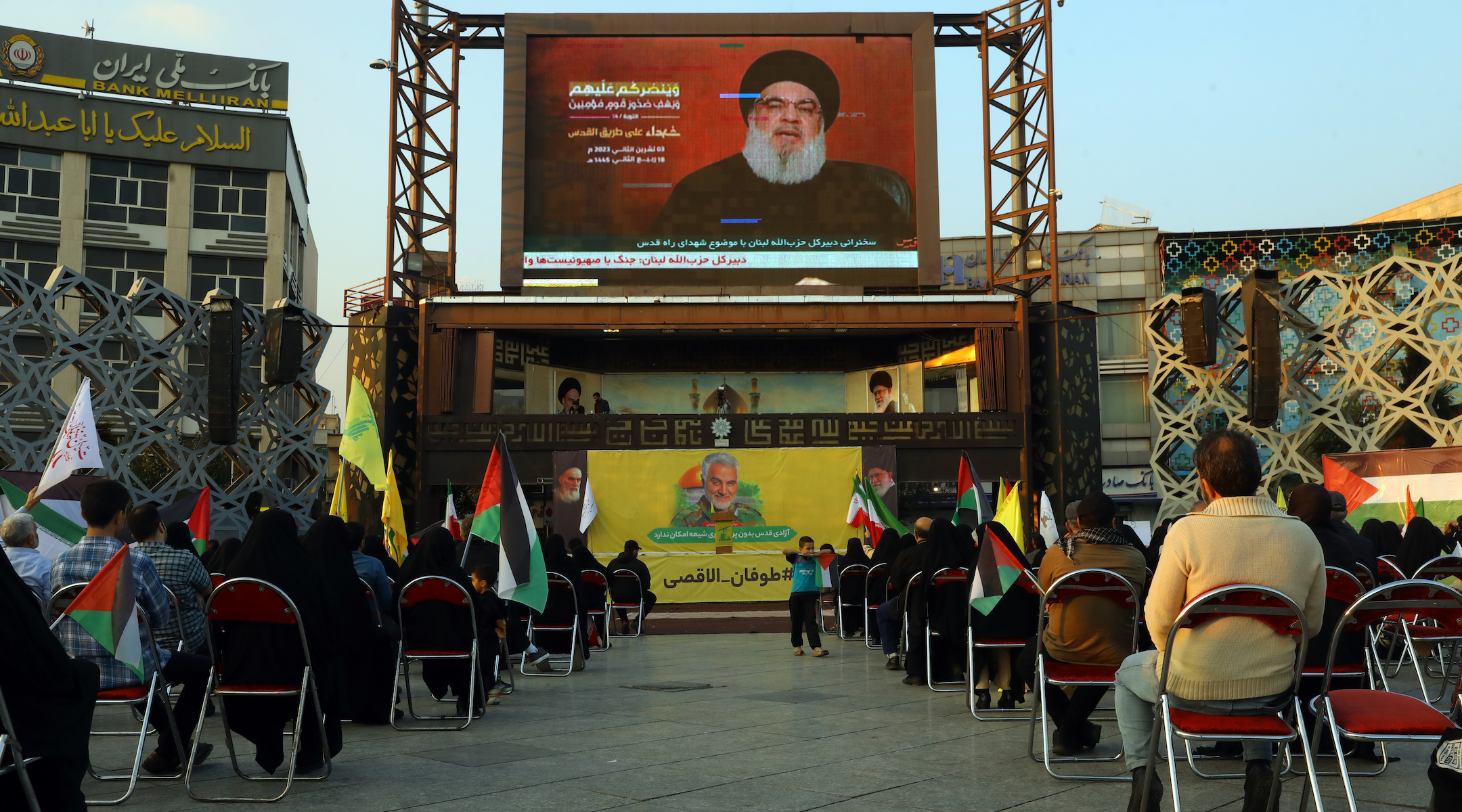 People listen to a speech by Hezbollah leader Hassan Nasrallah on Nov. 3, 2023 in Tehran, Iran. 