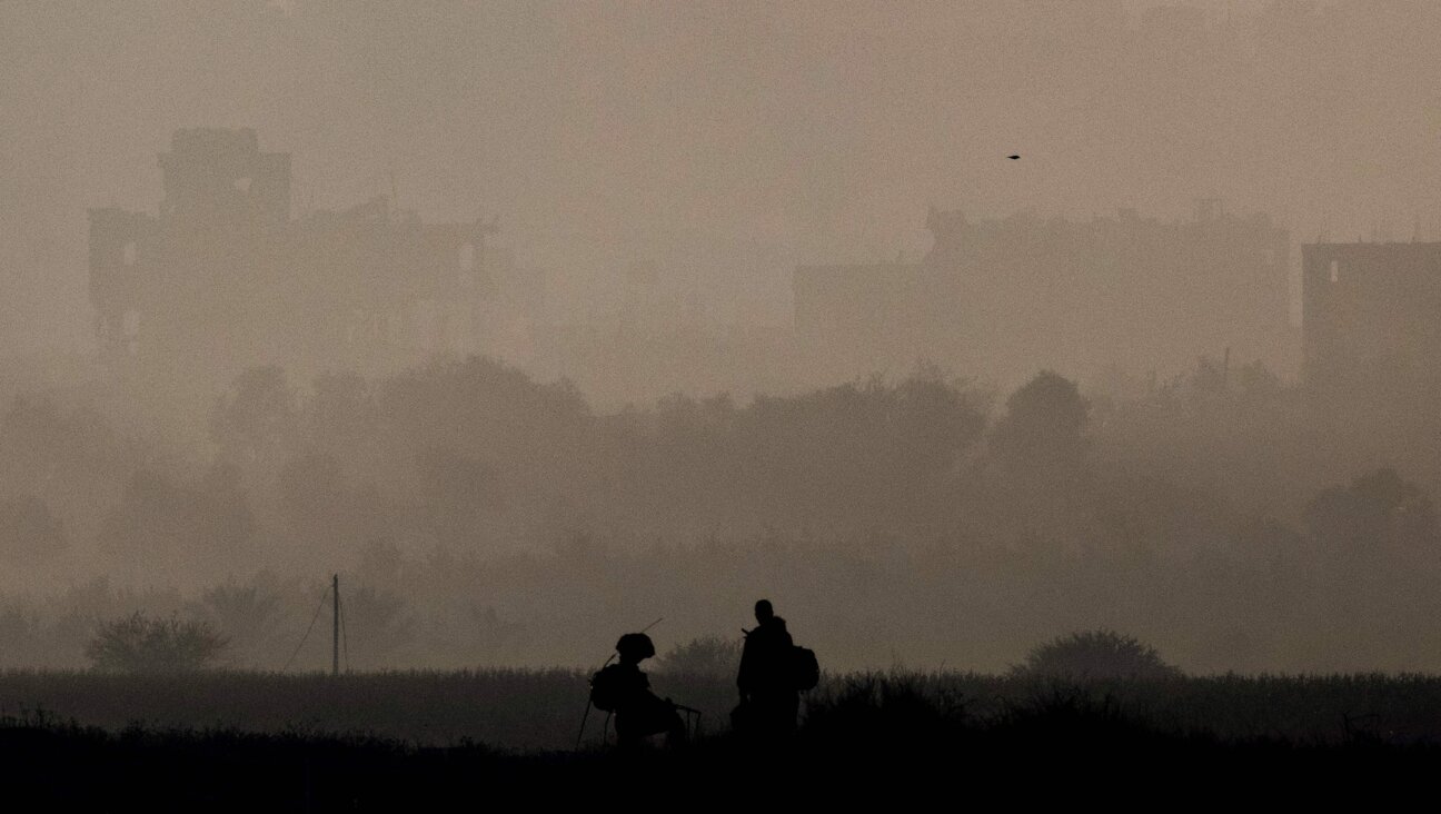 Israeli soldiers patrol near the border with the Gaza Strip in southern Israel on Nov. 16.