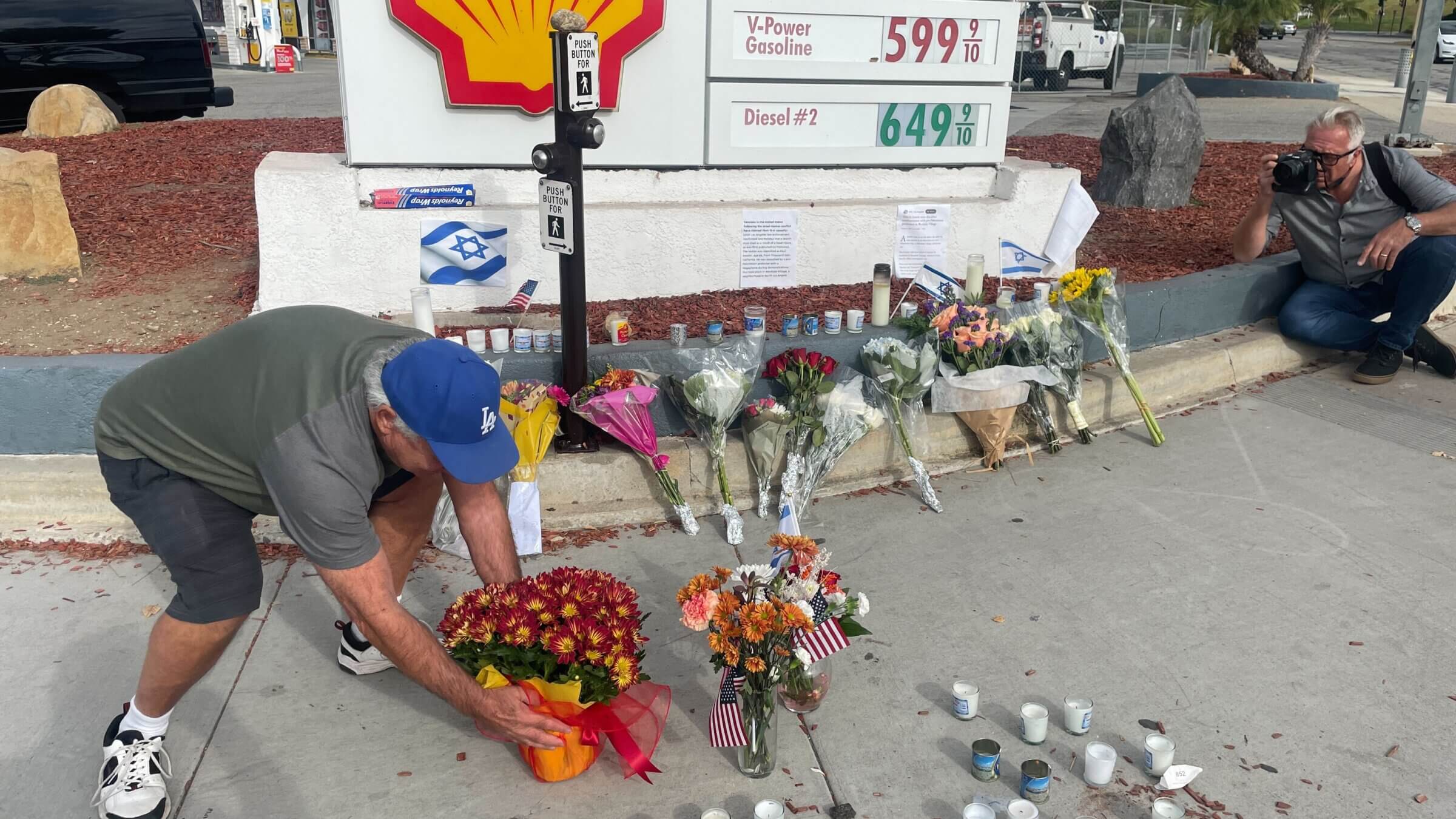 Gary Gerber, 72, on Nov. 7, 2023, brought flowers to a temporary memorial for Paul Kessler that was set up at the site of his injury.