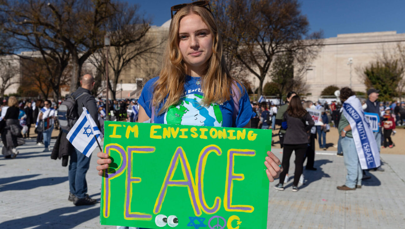 Sabrina Rubenstein, a recent Tulane University graduate, holds a sign at the March for Israel in Washington, D.C. on Nov. 14.