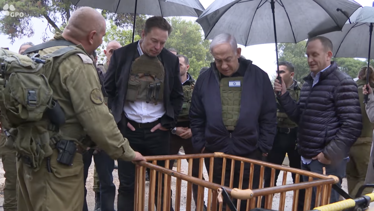 Elon Musk and Israeli Prime Minister Benjamin Netanyahu visit Kibbutz Kfar Aza, which was attacked by Hamas on Oct. 7, on Nov. 27. 2023. (Screenshot from Israeli Prime Minister’s Office video)