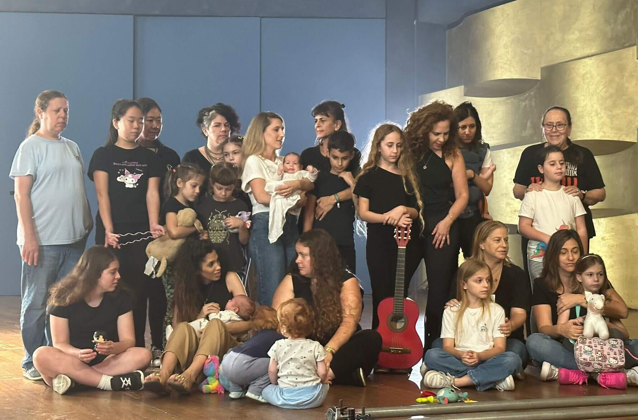 Mothers and children at the Tel Aviv Museum for the filming of <i>Children Need to Be Home.</i>