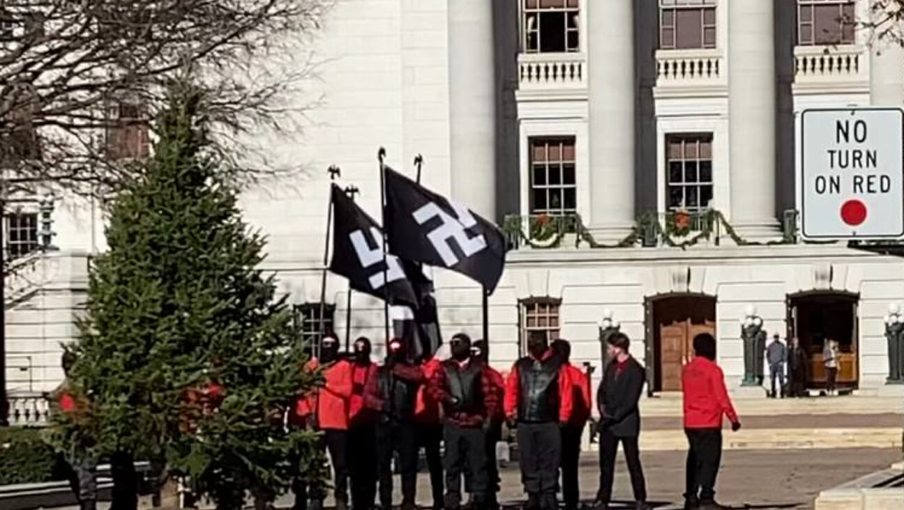 Member of the white supremacist Blood Tribe at the Wisconsin Capitol on Nov. 18, 2023