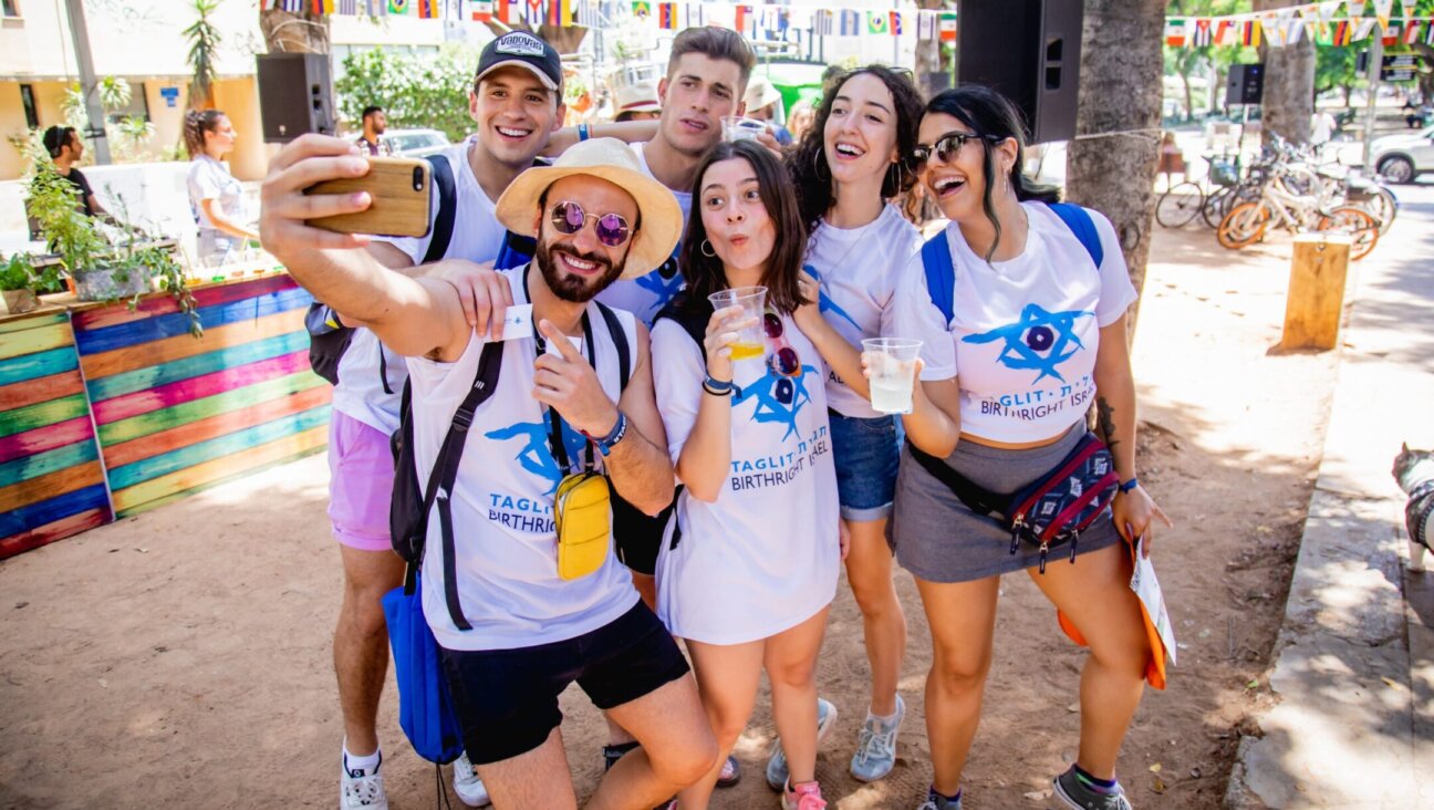 A group of Birthright Israel participants takes a selfie while touring the country on one of the group’s free trips for young adults. (Courtesy Birthright)